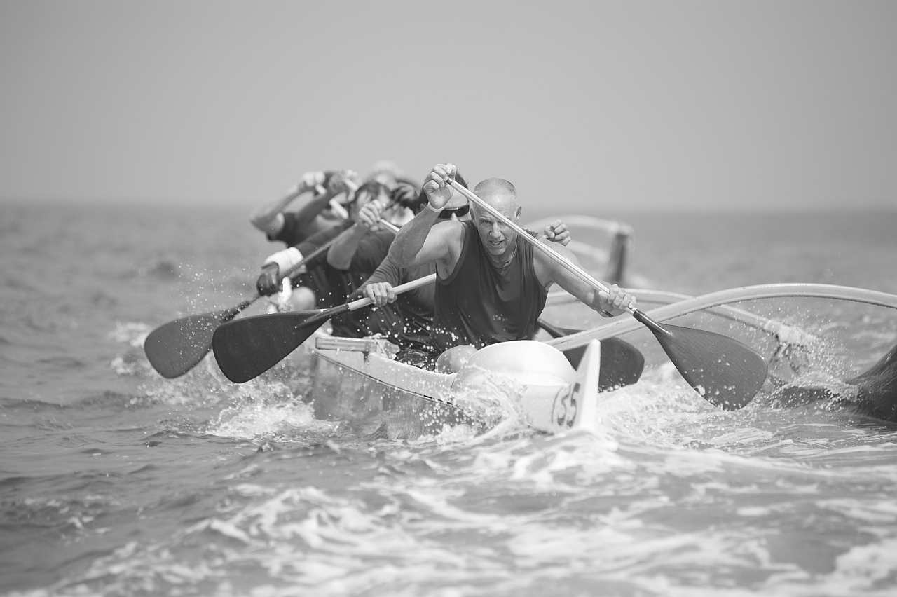 Outrigger canoeing team on water